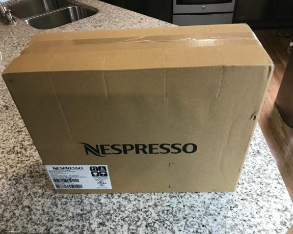 Embalaje en caja de cartón Nespresso Essenza Mini