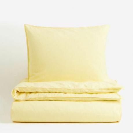 Copripiumino e cuscino giallo chiaro