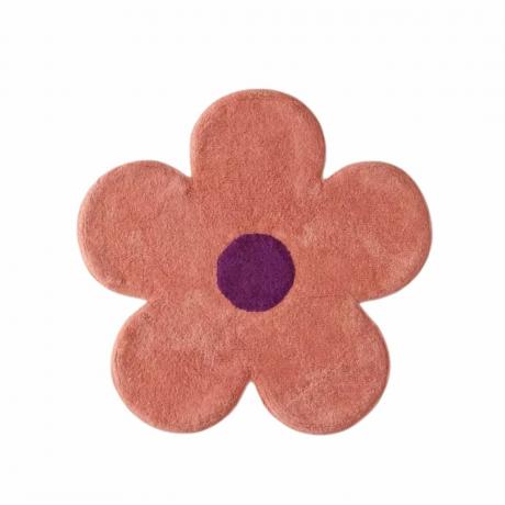 बैंगनी रंग के मध्य भाग के साथ एक गुलाबी फूल स्नान चटाई