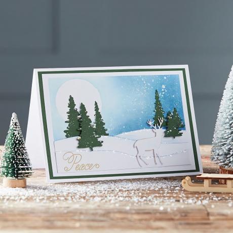 DIY-joulukortti, jossa on 3D-puita ja luminen kohtaus
