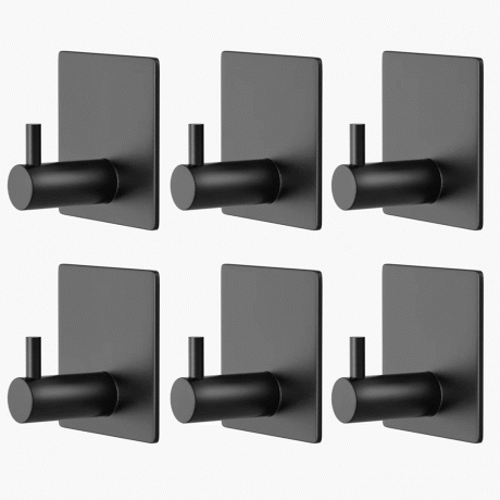 6 metalinės išvaizdos juodų lipnių kabliukų rinkinys.