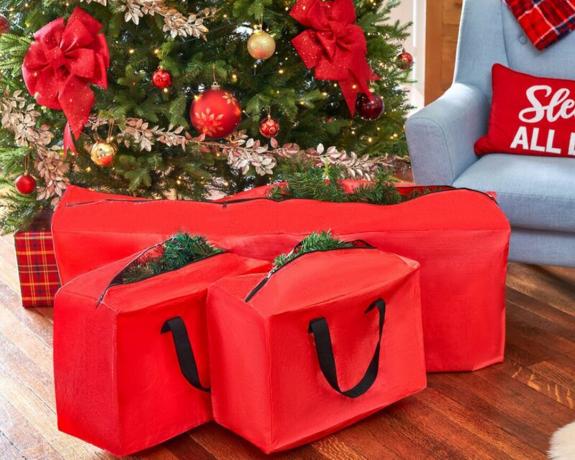 Et tredelt rødt juletreoppbevaringsposesett