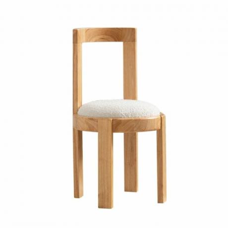 Una sedia in legno con seduta bianca