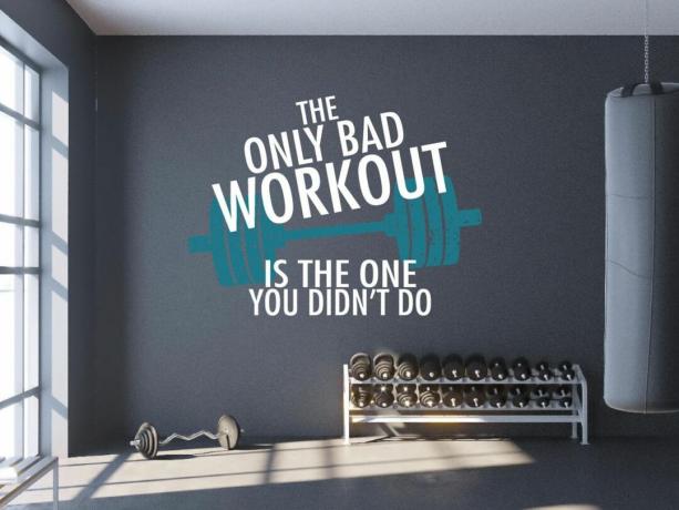 home gym met inspirerende quote aan de muur
