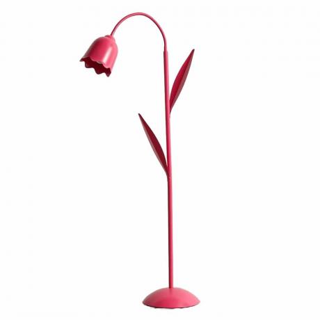 Een roze vloerlamp in de vorm van een tulp