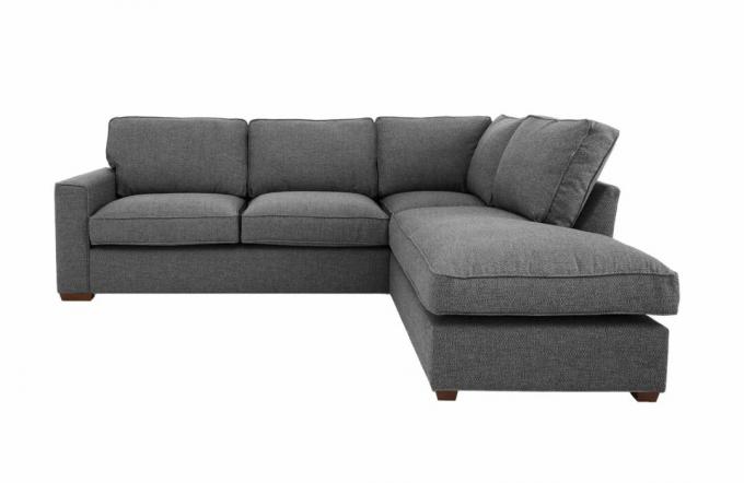 Un divano letto con chaise longue grigio scuro