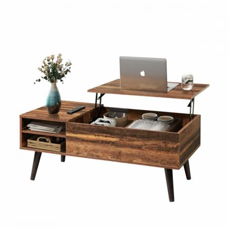 Un tavolino sollevabile in legno con degli oggetti al suo interno e un laptop sopra