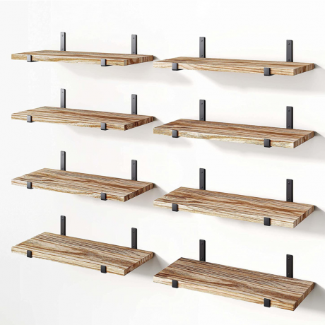 Un conjunto de ocho estantes de madera con soportes negros.