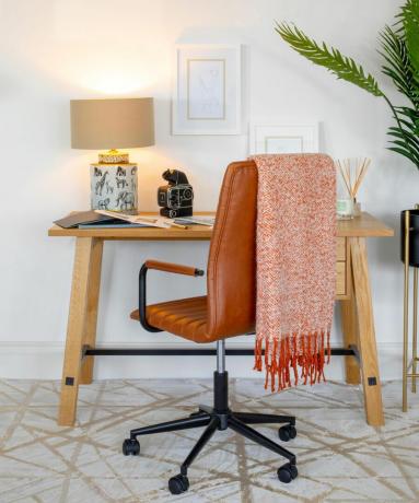 Safari Lamp 150 يورو ، Weaver Throw in Rust 40 يورو ، Wick & Wish Diffuser ، Stockholm Chair ، Stockholm Desk in home office by Harvey Norman
