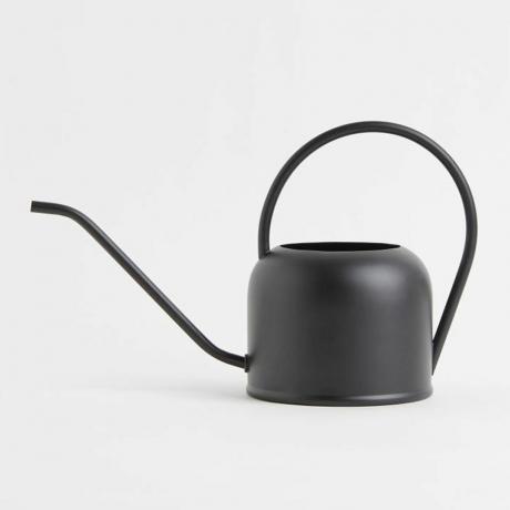 Kaleng penyiram modern hitam dengan siluet minimalis