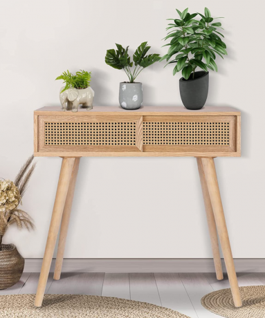 Table console en bois avec des plantes en pot sur le dessus
