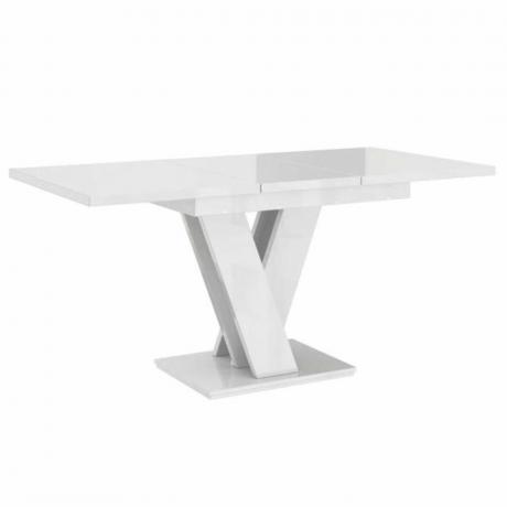 Tavolo in marmo bianco con gambe incrociate