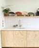 Puertas de gabinete de bricolaje: cómo actualizar las puertas de su cocina con madera contrachapada