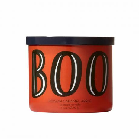 Čierno-oranžová nádoba na sviečku s nápisom „boo“