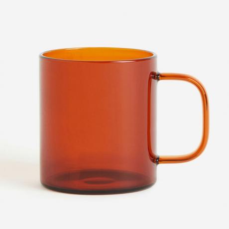 Oranžinio stiklo puodelis