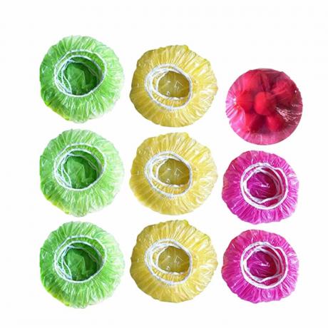 Et sæt cirkulære madbetræk i grøn, gul og pink