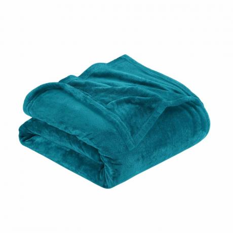 Um cobertor fofo de cor azul-petróleo