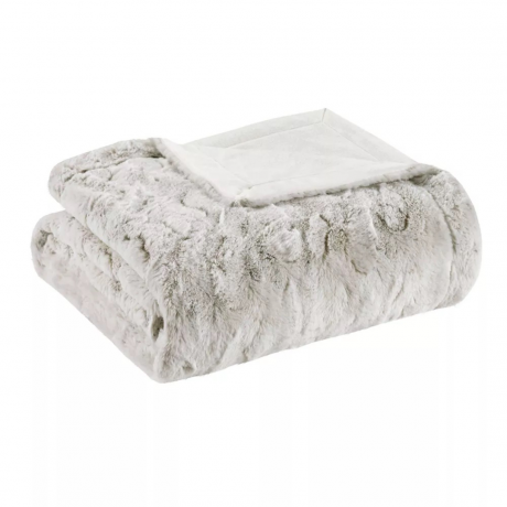 Εικόνα προϊόντος μιας ελαφριάς ουδέτερης κουβέρτας από ψεύτικη γούνα με φόδρα σερπά