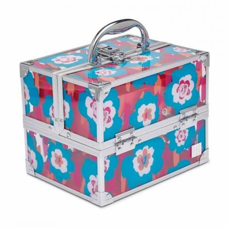 O cutie de machiaj în roz, albastru și alb are un design retro cu flori