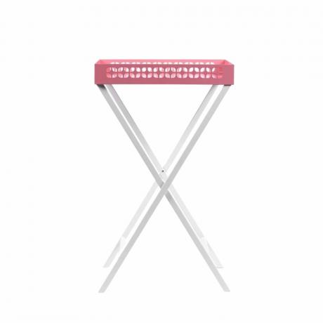 Ein rosafarbener Tabletttisch mit Stahlbeinen