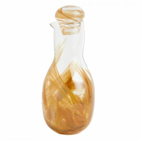 bouteille d'huile en verre et détail jaune moutarde
