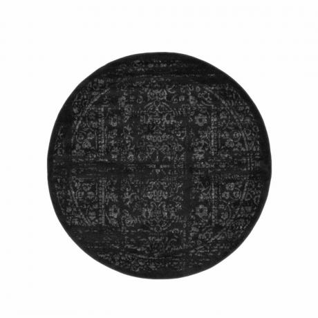 Una alfombra circular negra